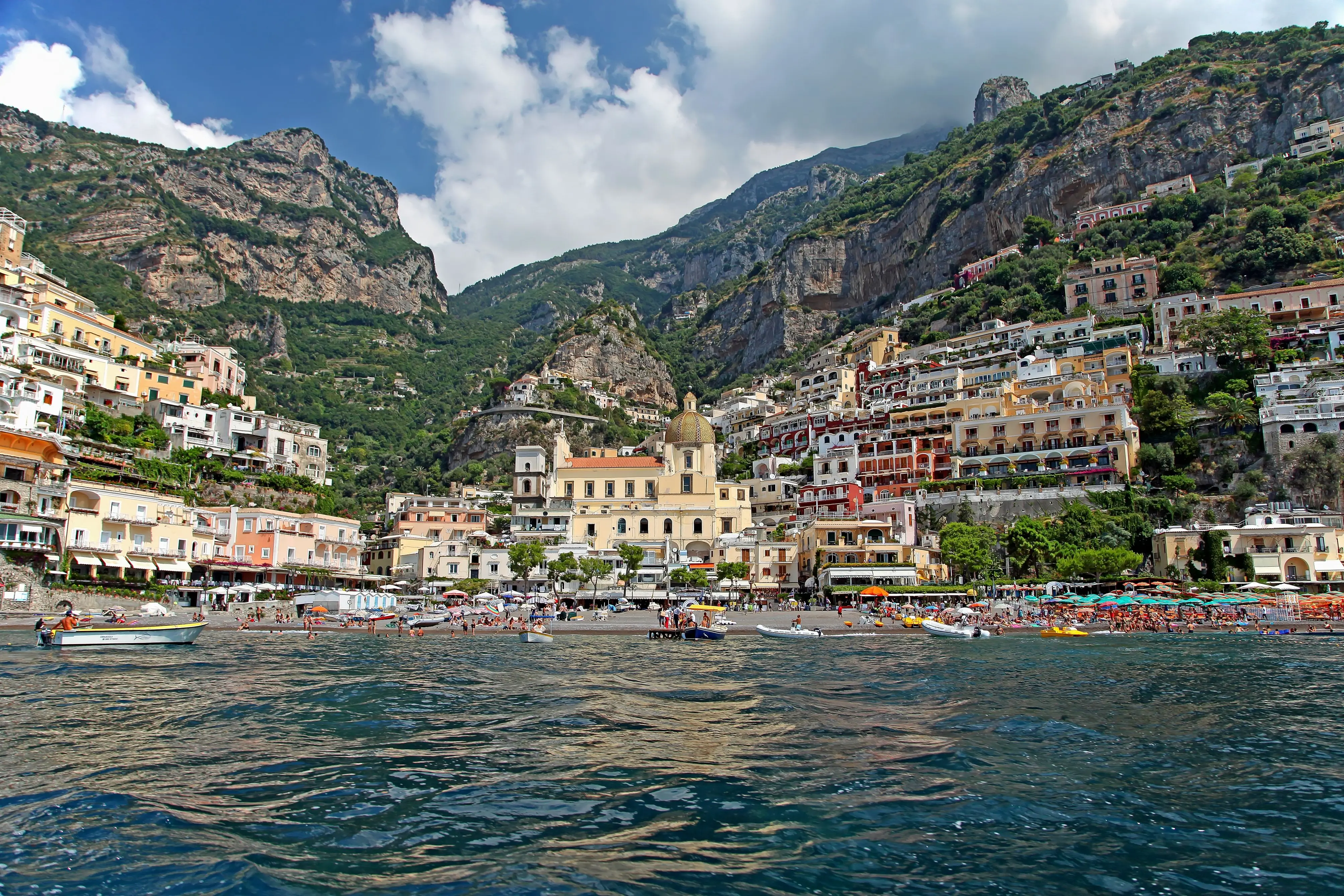 Positano's pastel houses stacked up the cliff above the bay